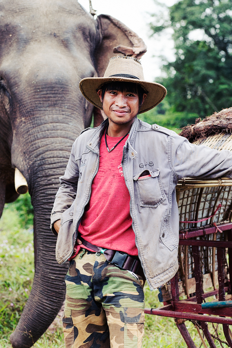 Sompong Sintham, 25 years old, was the mahout for elephant Mae Kham, age 42. He learned how to be a mahout from his father-in-law, who also traveled with the caravan.